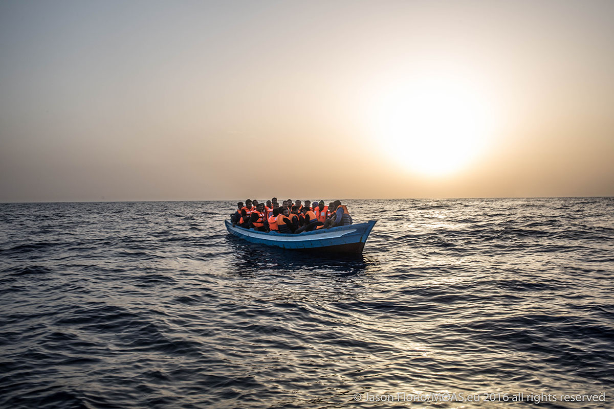 2.47am a call was transmitted from an Italian ship to the MOAS ship concerning two rubber boats. The boats were eventually intercepted by the Italian Coast Guard, but while on route to the last known postion of one of the migrant boats the MOAS team came across a small wooden boat carrying 26 men, 23 Bangladeshi, one Gambian, 16 year old Lamin Jarju from Latrakunda, The Gambia, one Senegalese from Koalak and one Ivorian. They said they had left Sabrata on June 9th and had been at sea for three days. But the MOAS crew observed thye looked in too a condition to have really been at sea that long. Lamin gave me his uncle Ibrima Tamba's number in Brusubi. I said I would try and get a message to him +220 9901283