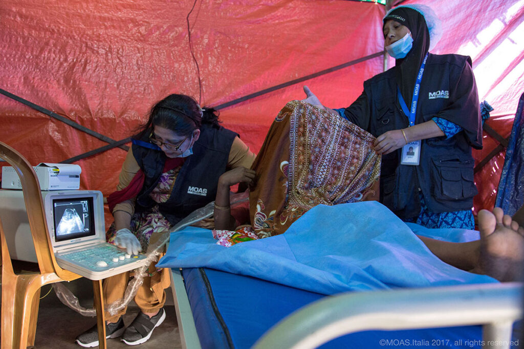A pregnant Rohingya woman undergoes a scan at the MOAS Aid Station in Shamlapur.