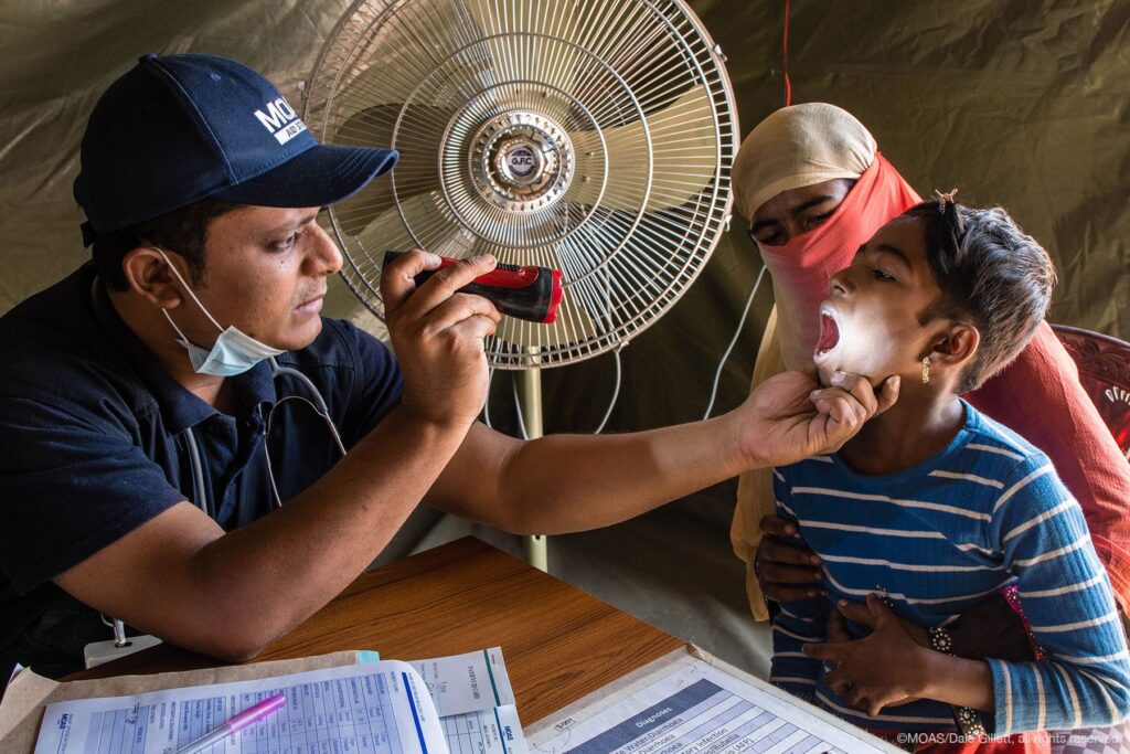 Young girl being treated at Aid Station, Bangladesh
