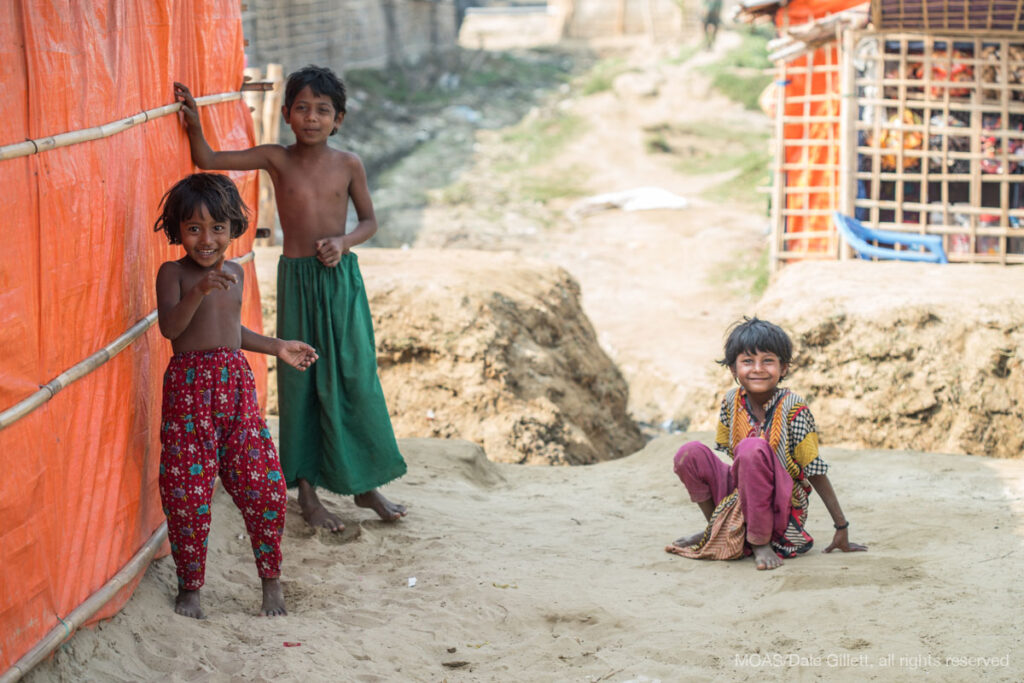three-rohingya-refugee-children-play-in-shamlapur-camp-cox-bazar-bangladesh-07368_copyright_MOAS_Dale-Gillett